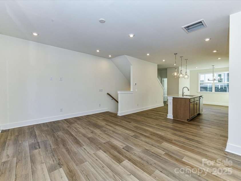 6013 Pivot Court, Charlotte, NC 28205.  MLS# CAR4256569, YatesRealty ID 11283. Connected and Seamlessly Blended Living Spaces at Second Floor.