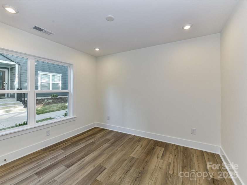 6013 Pivot Court, Charlotte, NC 28205.  MLS# CAR4256569, YatesRealty ID 11283. First Floor Guest Bedroom or Flex Space.