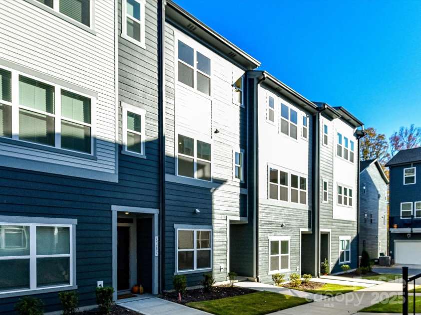 6013 Pivot Court, Charlotte, NC 28205.  MLS# CAR4256569, YatesRealty ID 11283. Private Courtyards and Maintenance Free Exteriors.