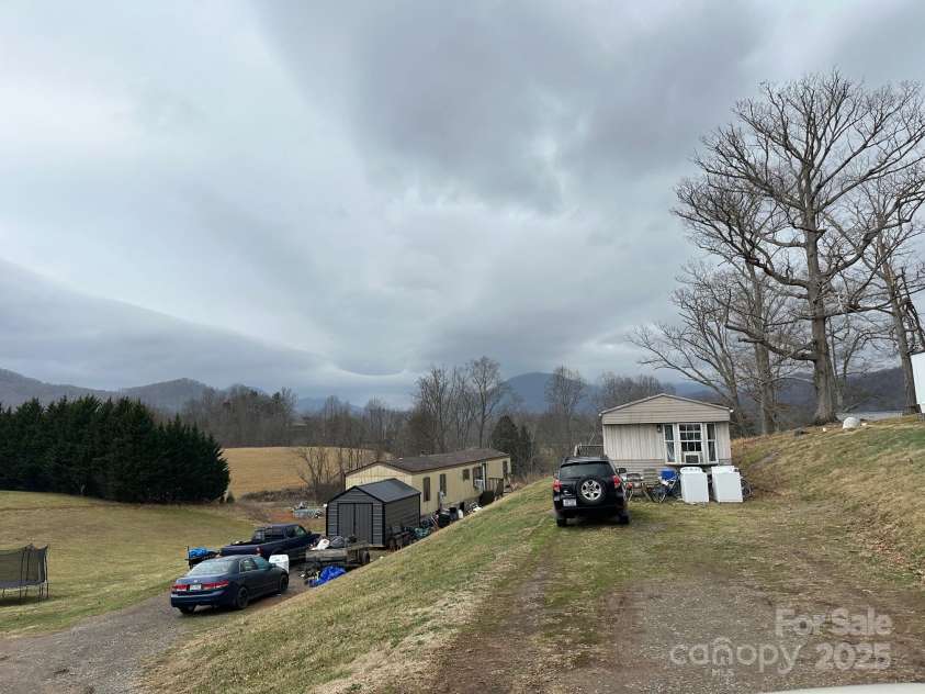 537 Old Newfound Road, Leicester, NC 28748.  MLS# CAR4222020, YatesRealty ID 1129. 2 of the single wides