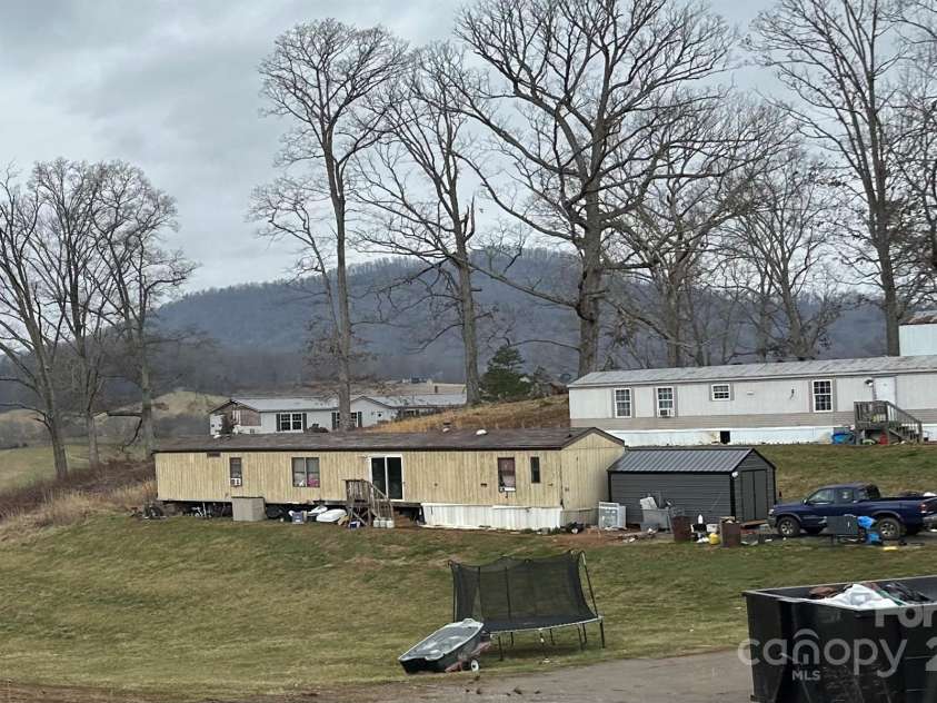 537 Old Newfound Road, Leicester, NC 28748.  MLS# CAR4222020, YatesRealty ID 1129. 3 single wides