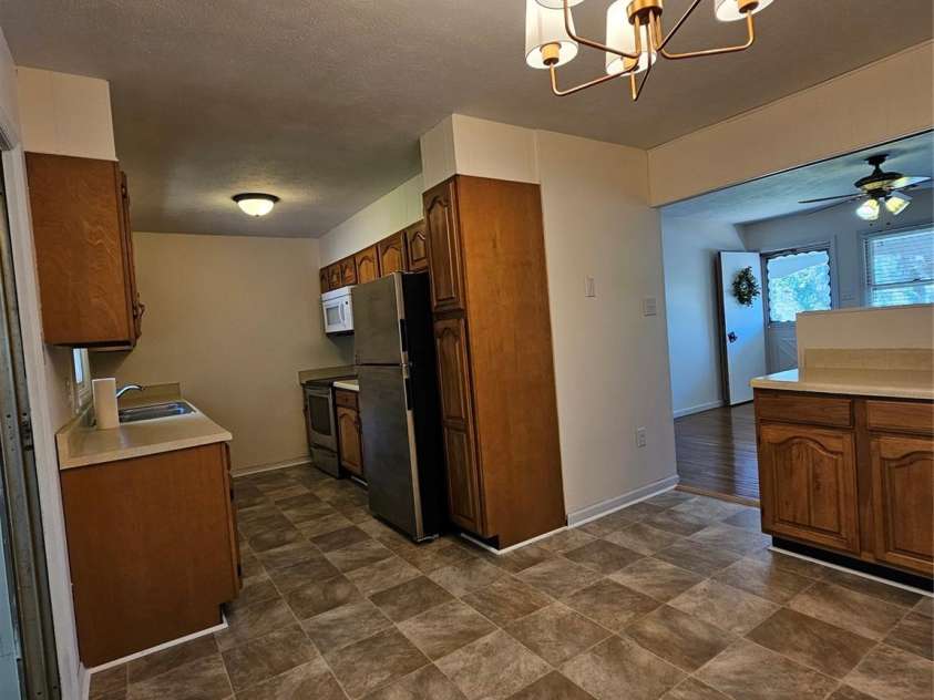 3220 Sweeten Creek Road, Asheville, NC 28803.  MLS# CAR4366165, YatesRealty ID 11290. Kitchen/Dining