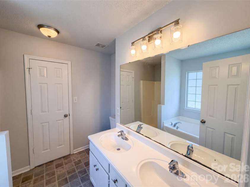 8236 Chilkoot Lane, Locust, NC 28097.  MLS# CAR4369405, YatesRealty ID 11291. 