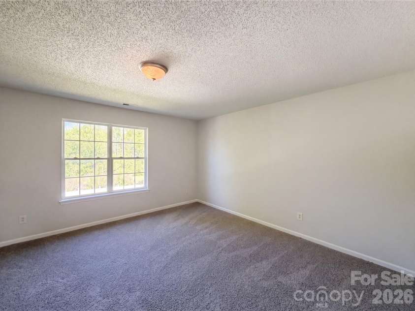 8236 Chilkoot Lane, Locust, NC 28097.  MLS# CAR4369405, YatesRealty ID 11291. 