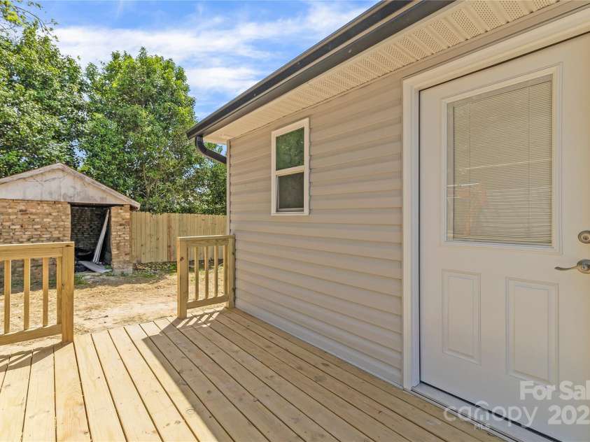 109 Poplar Street, Stanley, NC 28164.  MLS# CAR4246662, YatesRealty ID 11304. Side deck