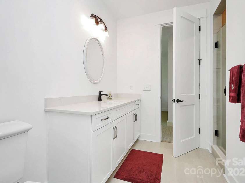 6178 Chimney Bluff Road, Lancaster, SC 29720.  MLS# CAR4172612, YatesRealty ID 11305. Upper level bath with walk-in shower