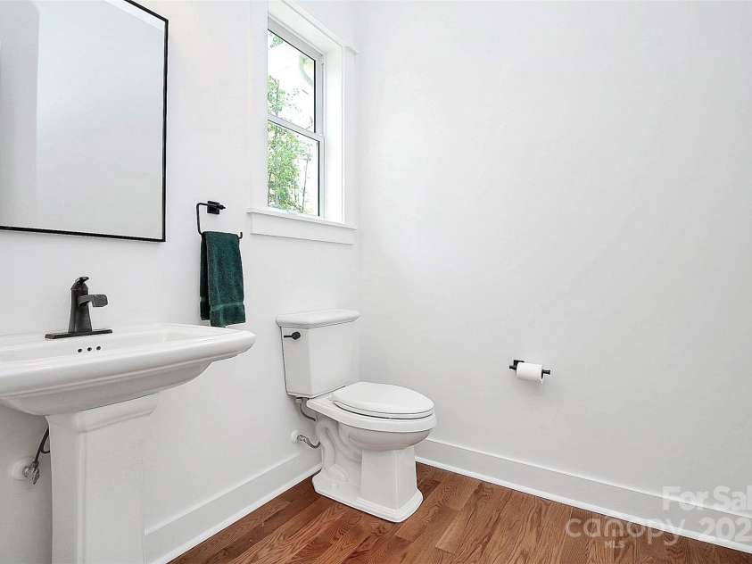 6178 Chimney Bluff Road, Lancaster, SC 29720.  MLS# CAR4172612, YatesRealty ID 11305. Upper level powder room