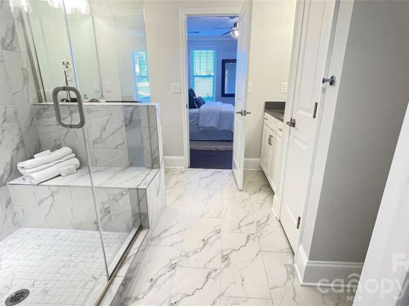 10225 Rainier Trail Drive, Huntersville, NC 28078.  MLS# CAR4341081, YatesRealty ID 11307. Example Primary Bathroom. *Not actual home.