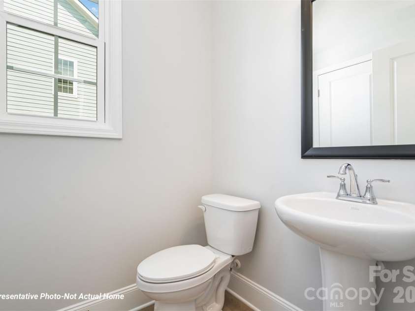 10225 Rainier Trail Drive, Huntersville, NC 28078.  MLS# CAR4341081, YatesRealty ID 11307. Half Bath Lower Level