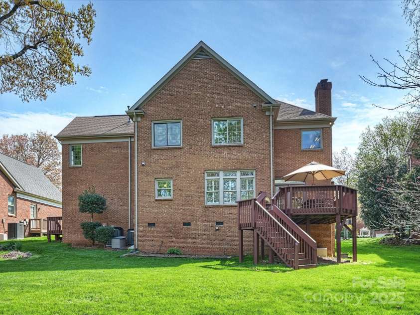 213 Walnut Point Drive, Matthews, NC 28105.  MLS# CAR4246616, YatesRealty ID 11307. Back of home
