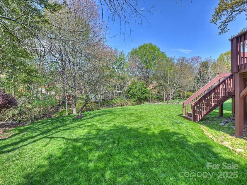 213 Walnut Point Drive, Matthews, NC 28105.  MLS# CAR4246616, YatesRealty ID 11307. Backyard