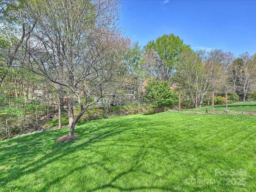 213 Walnut Point Drive, Matthews, NC 28105.  MLS# CAR4246616, YatesRealty ID 11307. Backyard