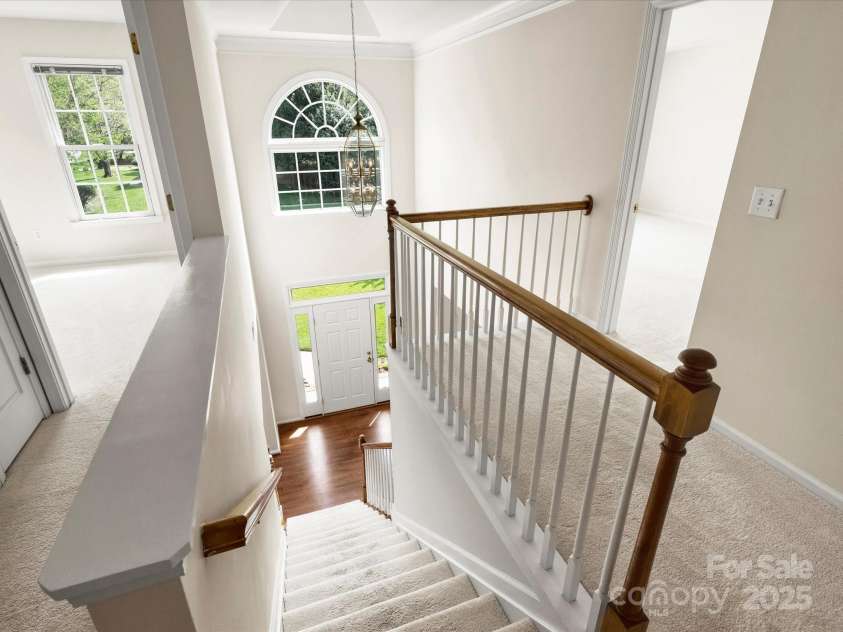 213 Walnut Point Drive, Matthews, NC 28105.  MLS# CAR4246616, YatesRealty ID 11307. Staircase