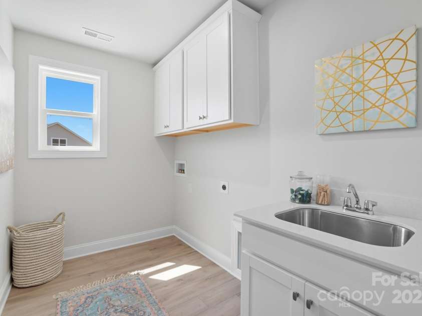 2522 Mabel Lane, Monroe, NC 28110.  MLS# CAR4255445, YatesRealty ID 11309. Upstairs Laundry