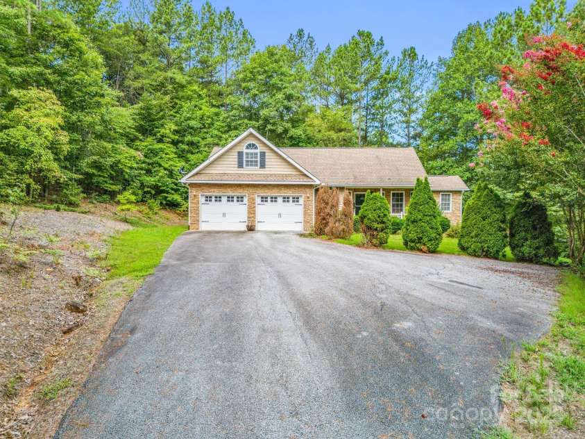 940 Hugh Champion Road, Tryon, NC 28782.  MLS# CAR4244388, YatesRealty ID 11316. 