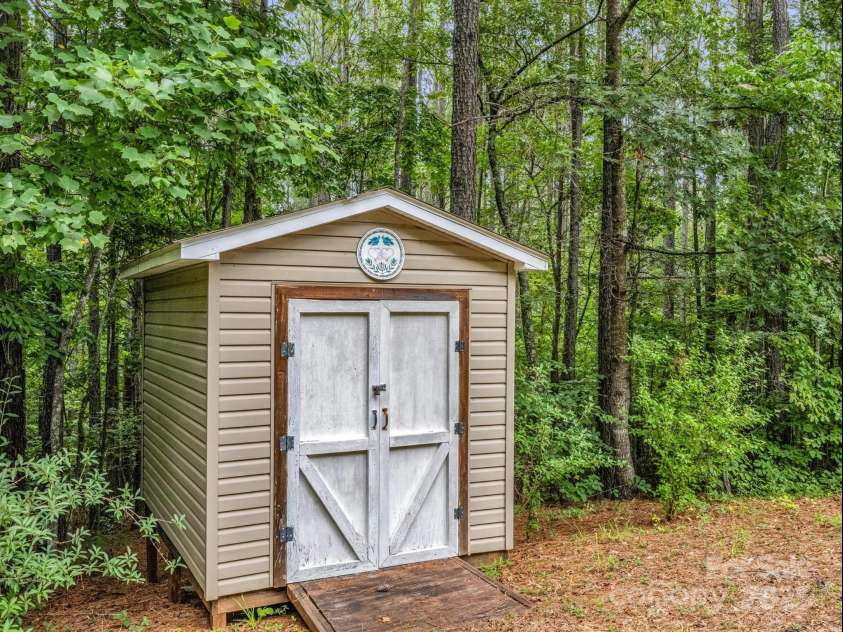 940 Hugh Champion Road, Tryon, NC 28782.  MLS# CAR4244388, YatesRealty ID 11316. 