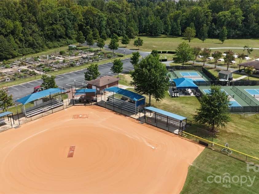 31470 Royal Tern Lane, Indian Land, SC 29707.  MLS# CAR4254598, YatesRealty ID 11317. Water's Edge Park: Softball diamond, pickleball courts in background