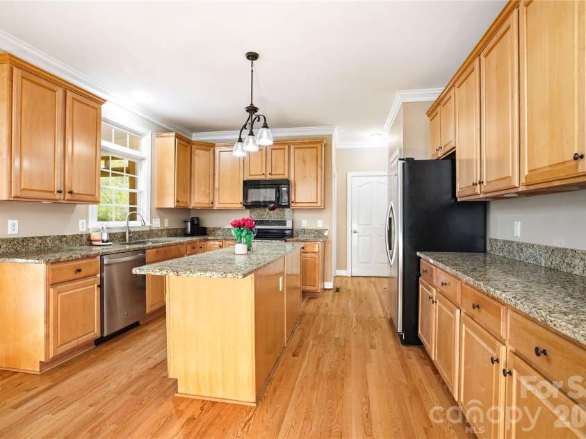 6123 Abergele Lane, Matthews, NC 28104.  MLS# CAR4361724, YatesRealty ID 11317. 