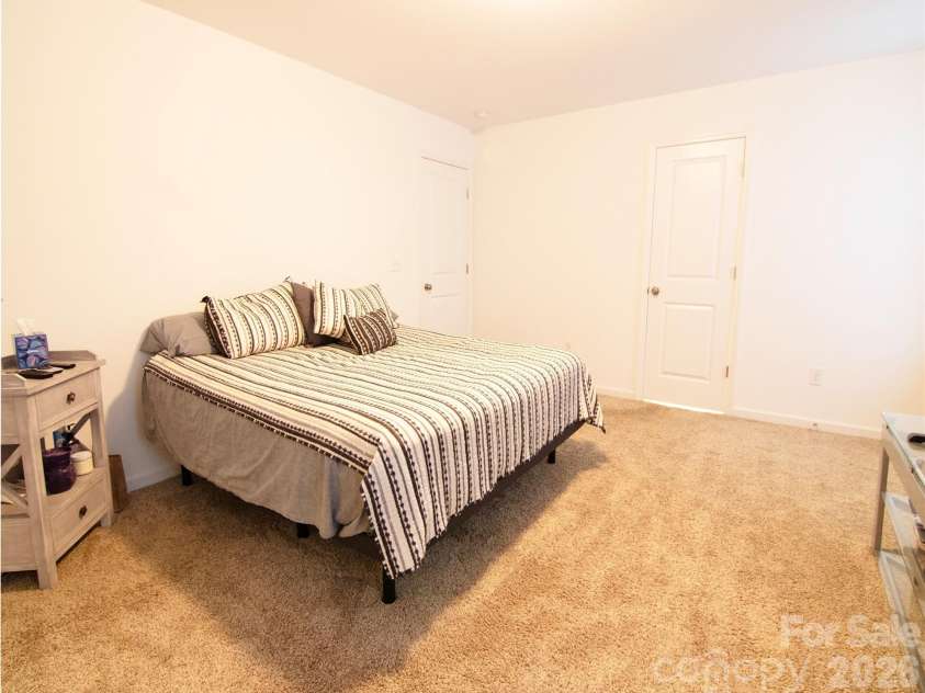 121 Asbury Place, Lexington, NC 27295.  MLS# CAR4352347, YatesRealty ID 11318. Primary Bedroom