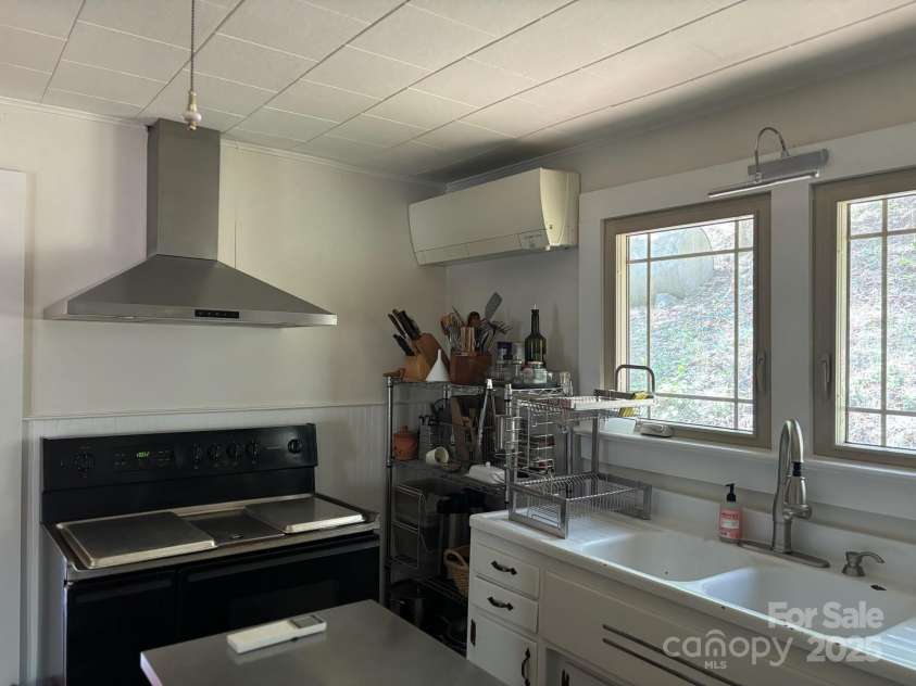 324 Marble Mine Road, Bakersville, NC 28705.  MLS# CAR4237907, YatesRealty ID 11321. Kitchen main house