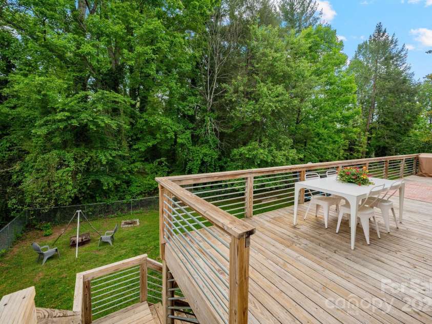 81 Bear Creek Road, Asheville, NC 28806.  MLS# CAR4253442, YatesRealty ID 11325. Large Deck Overlooks Backyard