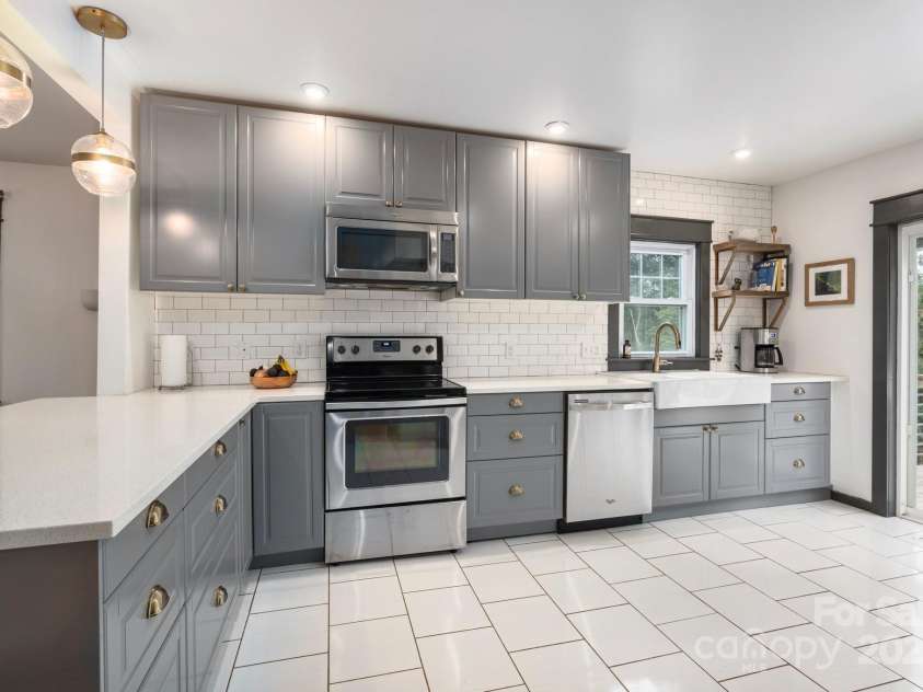 81 Bear Creek Road, Asheville, NC 28806.  MLS# CAR4253442, YatesRealty ID 11325. Quartz Counters * Ample Cabinetry