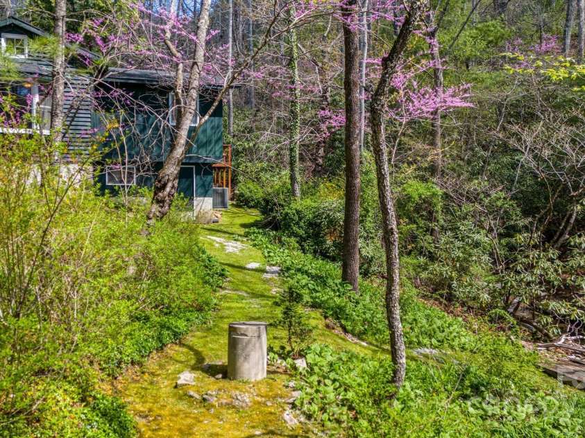 336&351 Colony Road, Hendersonville, NC 28792.  MLS# CAR4253932, YatesRealty ID 11328. 336 Colony next to creek