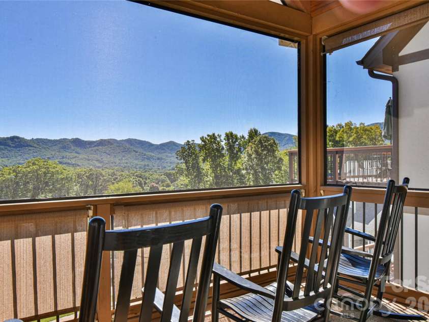 3 Leeds Lane, Black Mountain, NC 28711.  MLS# CAR4369032, YatesRealty ID 11329. Back screen porch