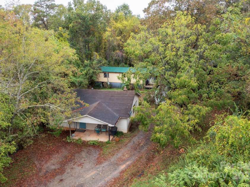 132 Little Knob Road, Asheville, NC 28803.  MLS# CAR4314463, YatesRealty ID 11330. Surrounded by Trees - Off-road Privacy