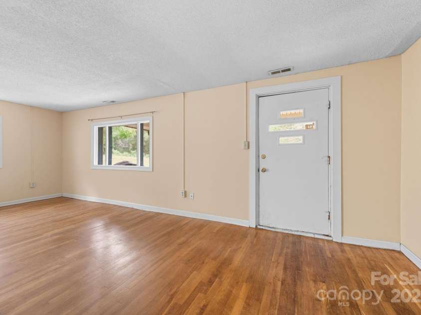 132 Little Knob Road, Asheville, NC 28803.  MLS# CAR4314463, YatesRealty ID 11330. Two Beds + One Bath