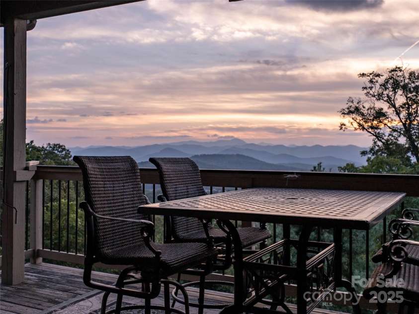 86 Distant View Drive, Asheville, NC 28803.  MLS# CAR4299899, YatesRealty ID 11339. Evening sunsets from the main level covered rear porch is where you'll want to spend all of your time enjoying the cool temperature. 