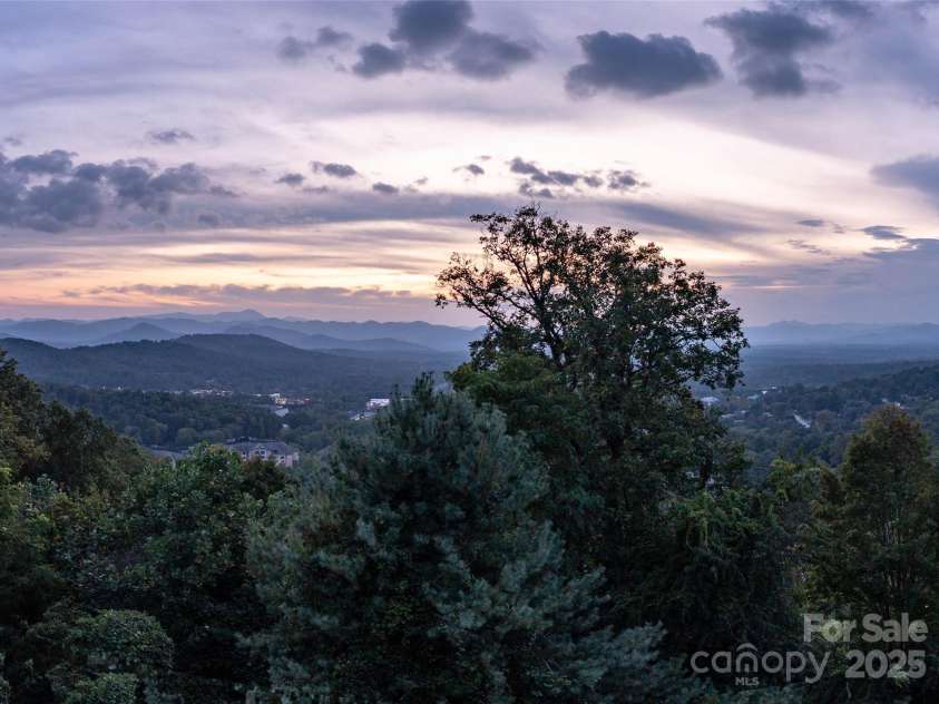 86 Distant View Drive, Asheville, NC 28803.  MLS# CAR4299899, YatesRealty ID 11339. Every season and every time of day offers a different perspective of this captivating view. 