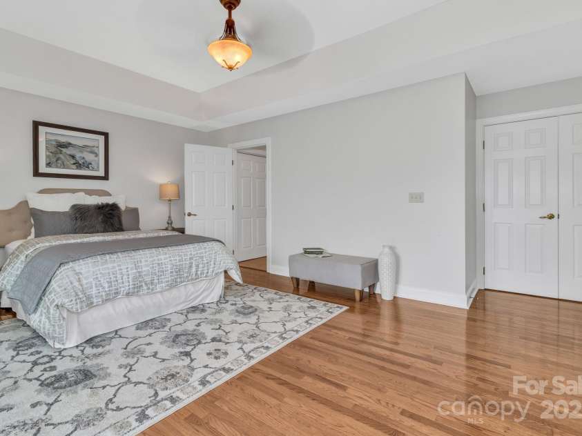 86 Distant View Drive, Asheville, NC 28803.  MLS# CAR4299899, YatesRealty ID 11339. Gracious primary bedroom just off the living room and on the main level. 