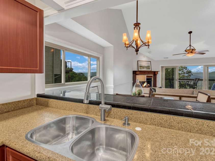 86 Distant View Drive, Asheville, NC 28803.  MLS# CAR4299899, YatesRealty ID 11339. Large open kitchen making it easy to move around if you have many chef's in the kitchen. 