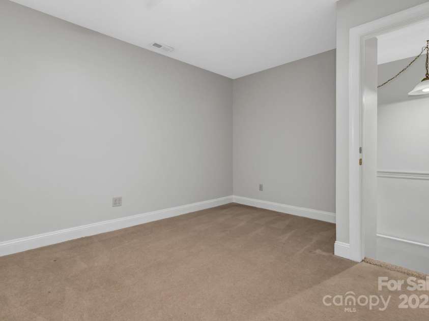 86 Distant View Drive, Asheville, NC 28803.  MLS# CAR4299899, YatesRealty ID 11339. Lower level bedroom #2