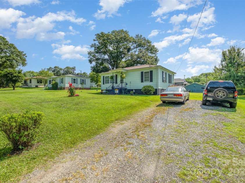 422 Wilson Street, Mount Holly, NC 28120.  MLS# CAR4272159, YatesRealty ID 1134. Front of 416 Wilson