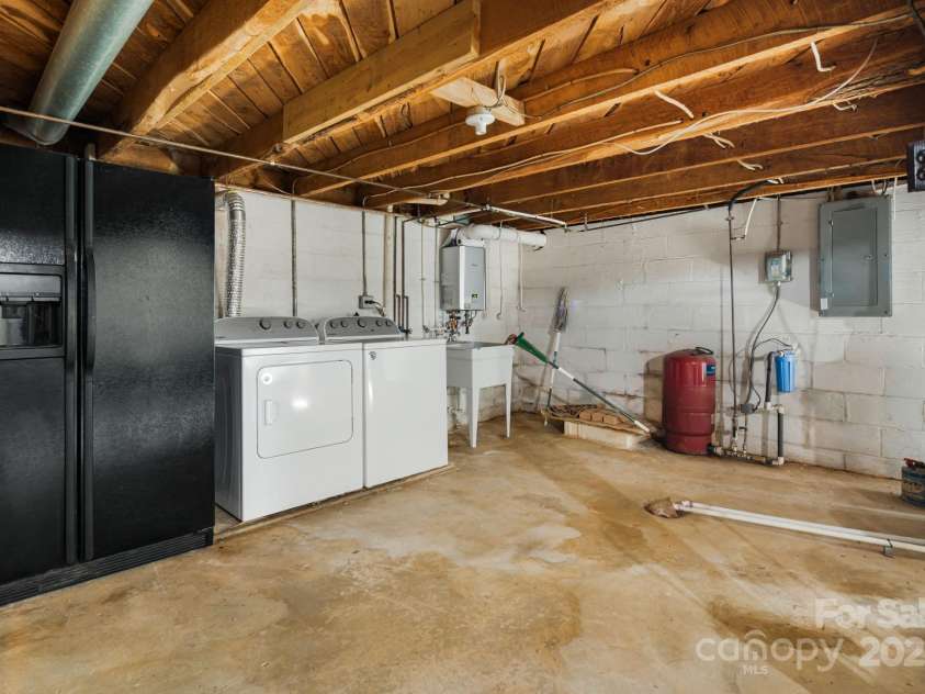 474 Smith Creek Road, Mars Hill, NC 28754.  MLS# CAR4293707, YatesRealty ID 11340. Full Walk Out Basement