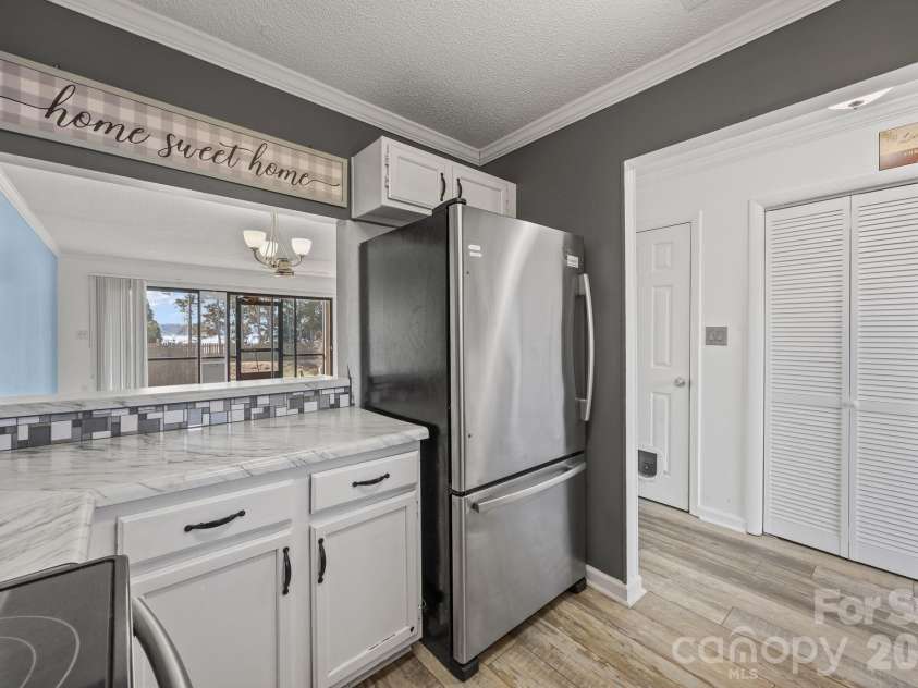 7602 Woods Lane, Cornelius, NC 28031.  MLS# CAR4345372, YatesRealty ID 11343. 