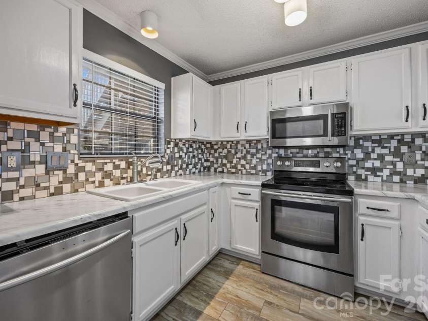7602 Woods Lane, Cornelius, NC 28031.  MLS# CAR4345372, YatesRealty ID 11343. 