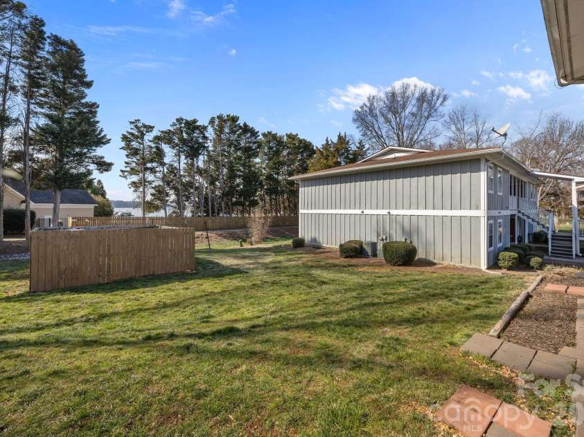 7602 Woods Lane, Cornelius, NC 28031.  MLS# CAR4345372, YatesRealty ID 11343. 