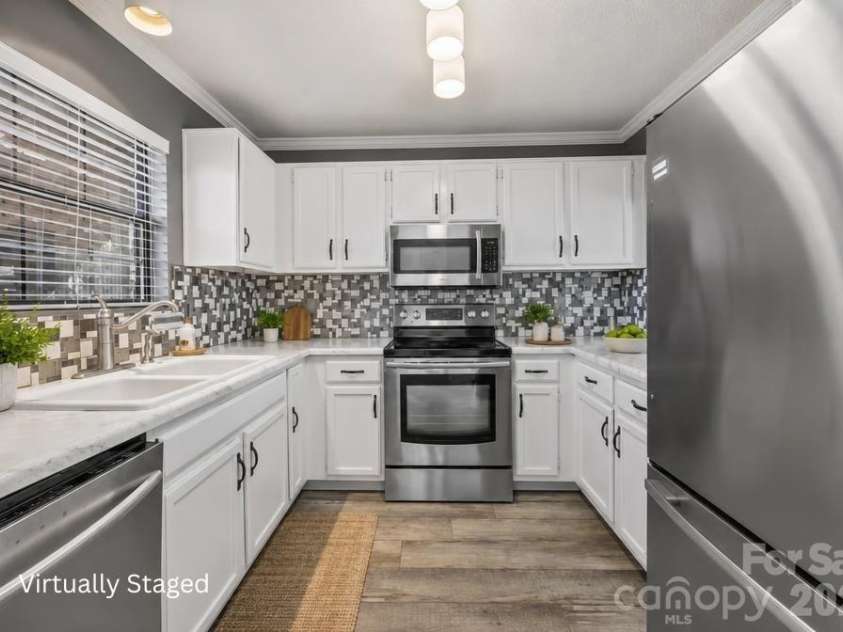 7602 Woods Lane, Cornelius, NC 28031.  MLS# CAR4345372, YatesRealty ID 11343. 