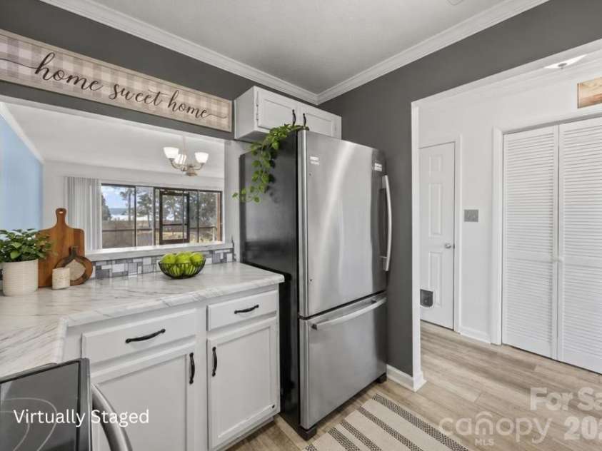 7602 Woods Lane, Cornelius, NC 28031.  MLS# CAR4345372, YatesRealty ID 11343. 