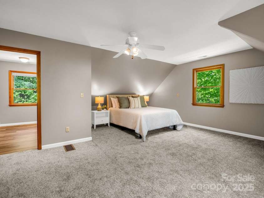 2304 Mountain Page Road, Saluda, NC 28773.  MLS# CAR4319701, YatesRealty ID 11346. Upper Level Primary Suite