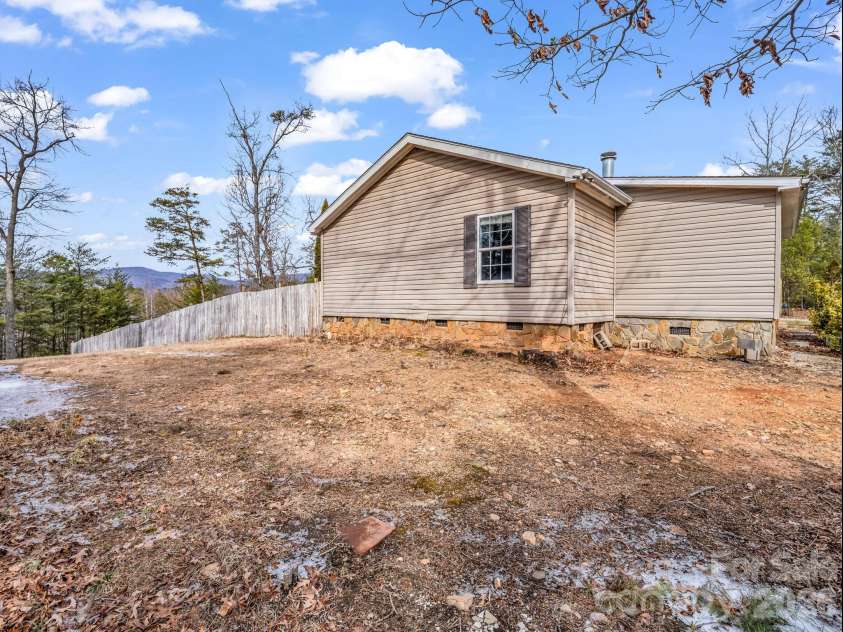 865 Boland Drive, Lake Lure, NC 28746.  MLS# CAR4343843, YatesRealty ID 11346. 
