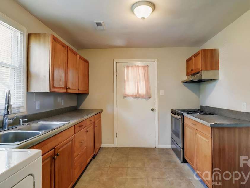 312 & 314 Charlotte Avenue, Mount Holly, NC 28120.  MLS# CAR4358116, YatesRealty ID 11357. Kitchen Unit 312