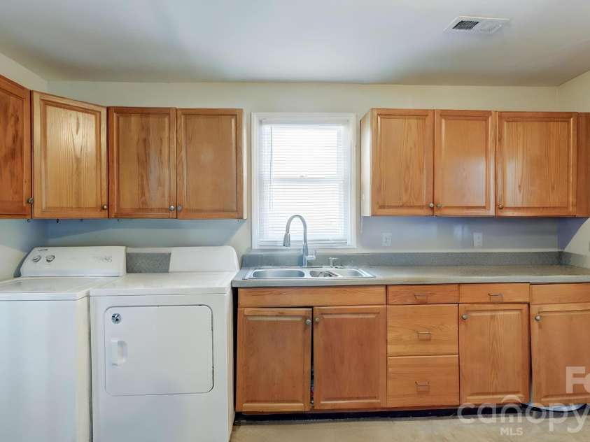 312 & 314 Charlotte Avenue, Mount Holly, NC 28120.  MLS# CAR4358116, YatesRealty ID 11357. Kitchen Unit 312