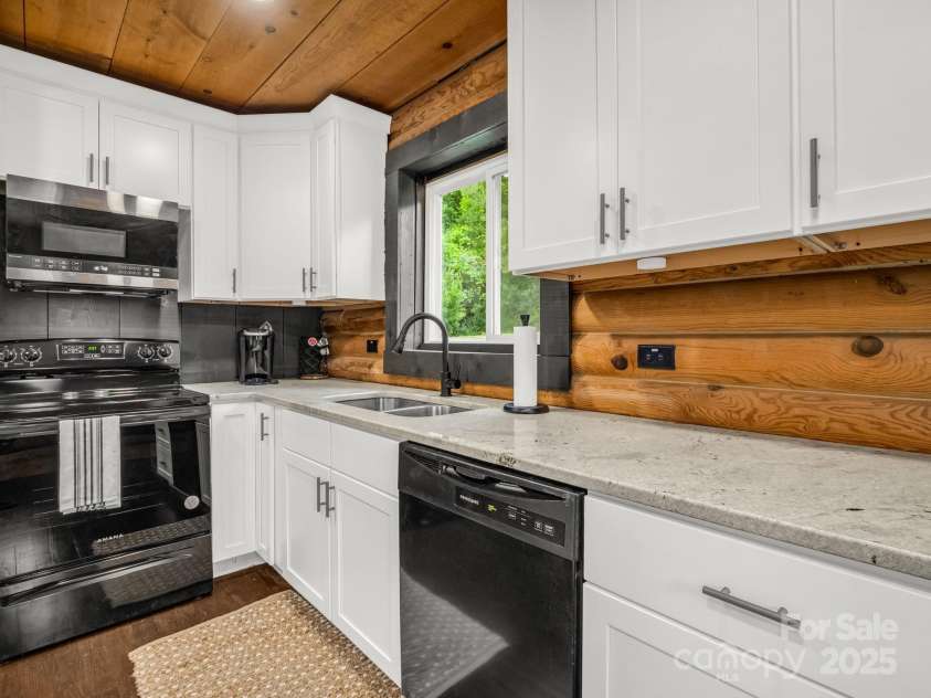 112 Bills Creek Road, Lake Lure, NC 28746.  MLS# CAR4256559, YatesRealty ID 11359. 