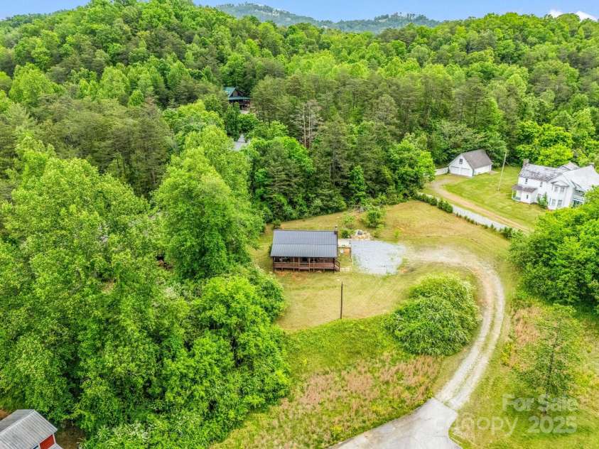 112 Bills Creek Road, Lake Lure, NC 28746.  MLS# CAR4256559, YatesRealty ID 11359. 