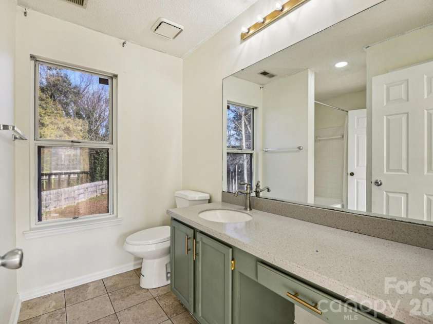 7106 Spring Creek Lane, Charlotte, NC 28273.  MLS# CAR4334554, YatesRealty ID 11359. Bathroom Up