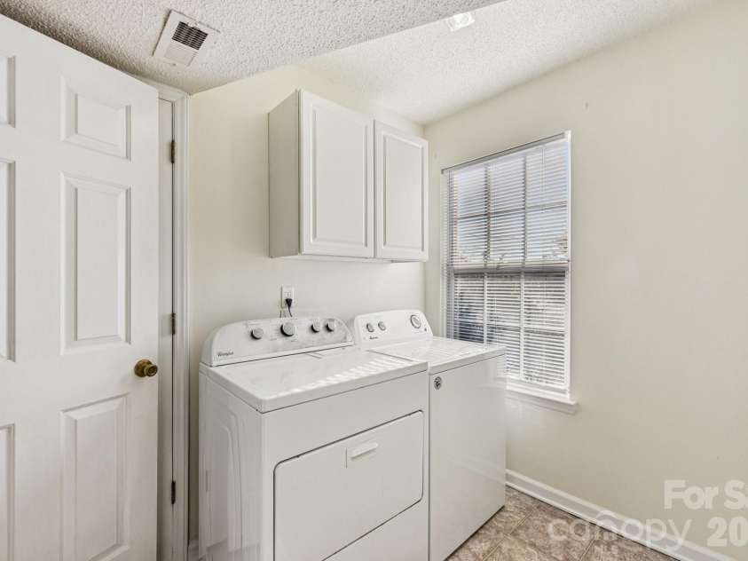 7106 Spring Creek Lane, Charlotte, NC 28273.  MLS# CAR4334554, YatesRealty ID 11359. Laundry